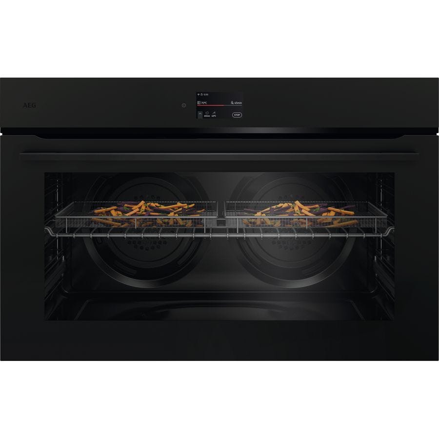 AEG 7000 Series 90cm pyrolytic oven in matte black, front view with a tray of food on the shelf
